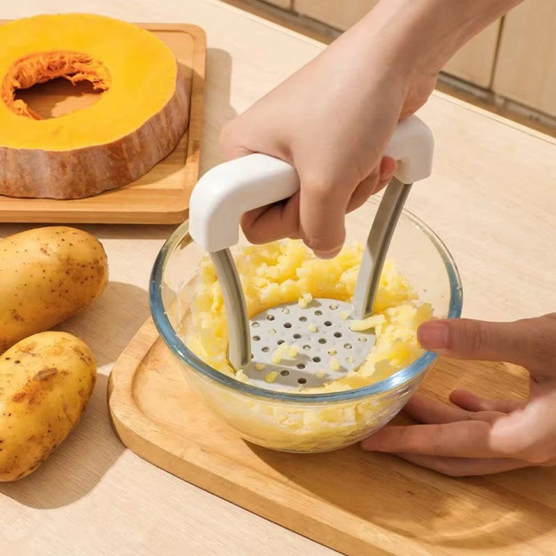 The Spud Smasher 3000: Tater Tamer with a Grip That Won't Slip and a Side of Juice!